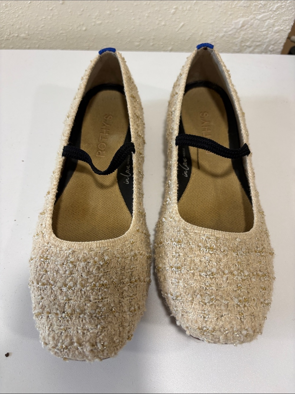 Rothy's Cream Tweed Ballet Flats with Black Elastic Strap and Blue Heel Tab
